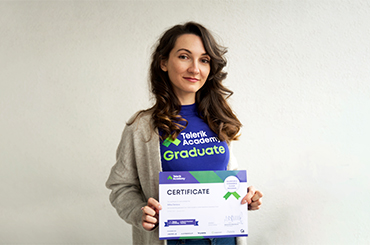 photo of milka deneva, a telerik academy upskill salesforce commerce cloud alumni, posing with her certificate and wearing a telerik academy graduate t-shirt