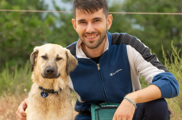 photo of valentin, a telerik academy alpha graduate, now a software engineer at tick42, with his dog