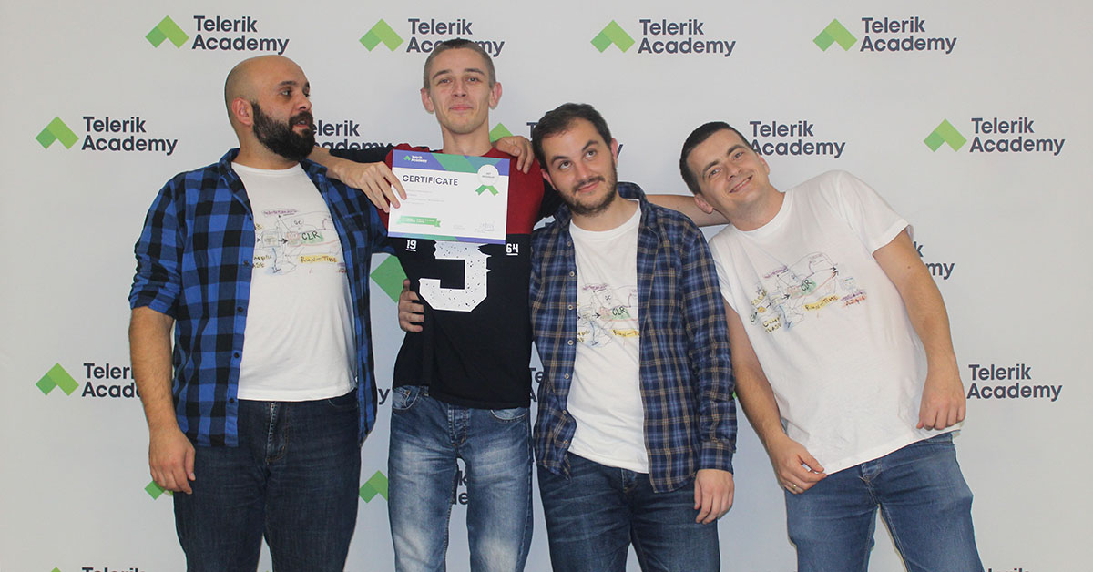 A photo of telerik academy alpha graduate with his teachers