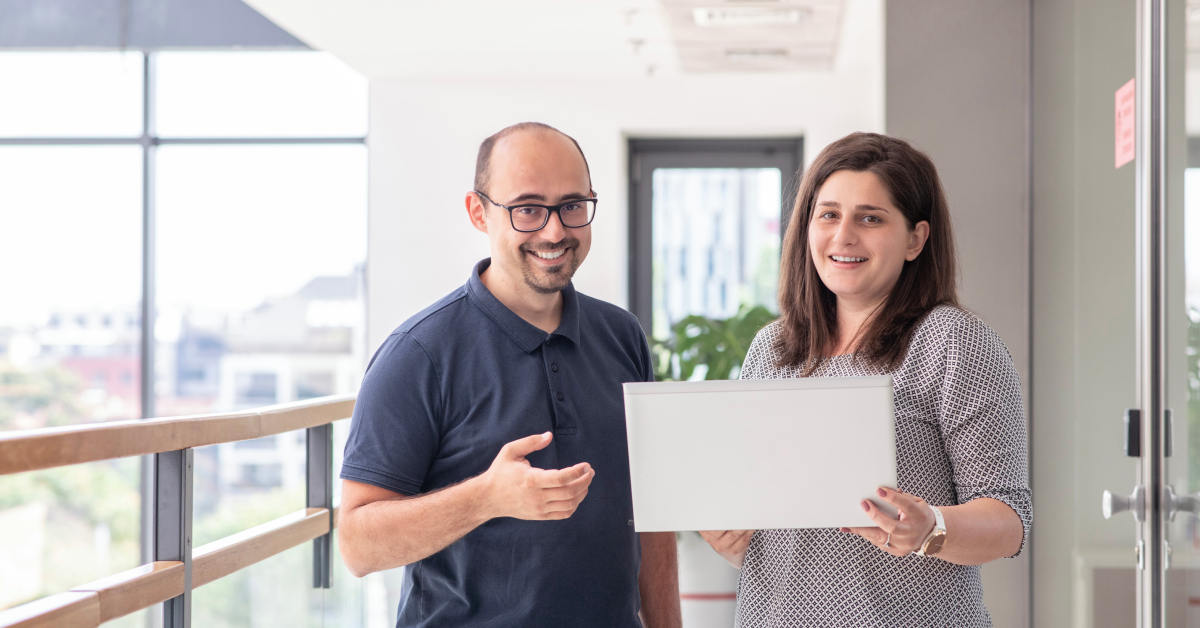 photo of ersoy hasan, head of software development unit, and ilina tomova, senior expert test and quality assurance, from procredit bank a telerik academy alpha partners.